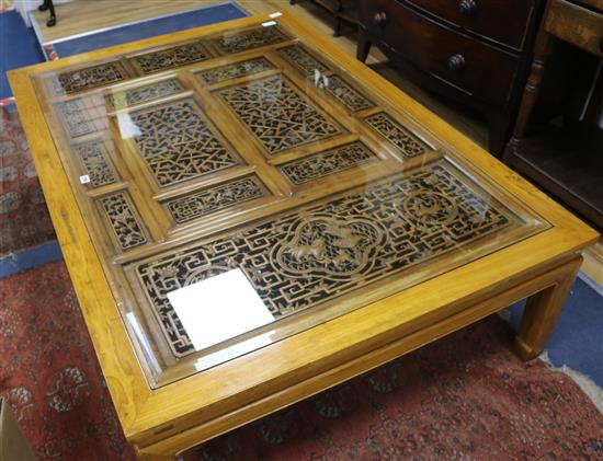 A Chinese elm panelled coffee table W.157cm